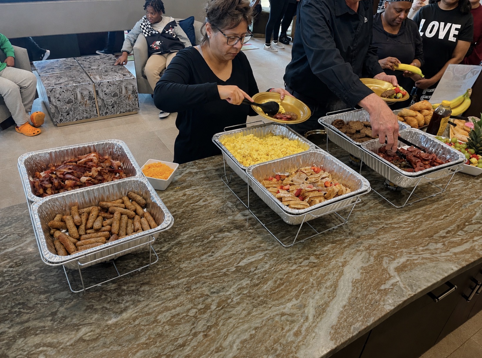 Neighbors gathered around a healthy community brunch
